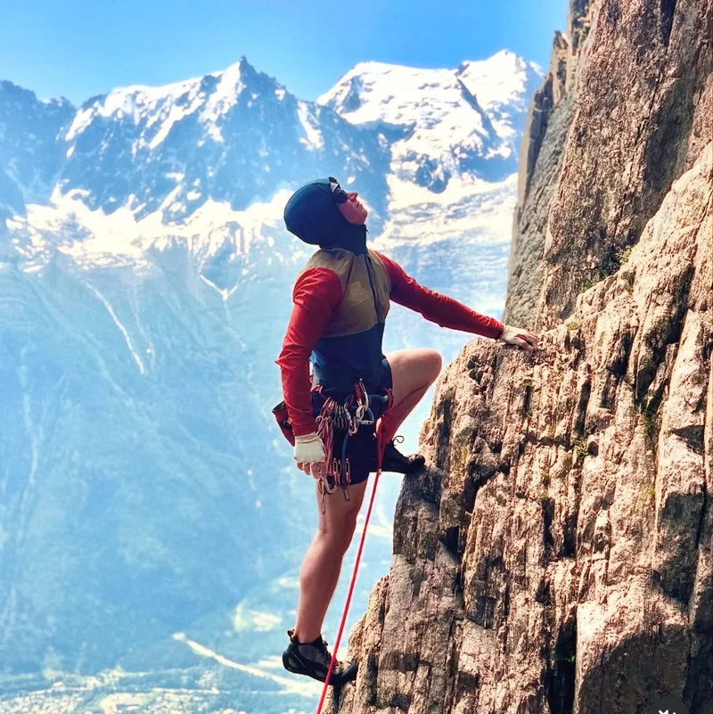 Mesa founder Joshua Kasumovic during a technical alpine climbing ascent; showcasing the rugged environments and extreme performance testing that inform Mesa footwear systems.